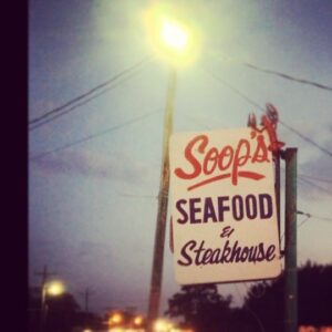 Soops Restaurant Sign at Night